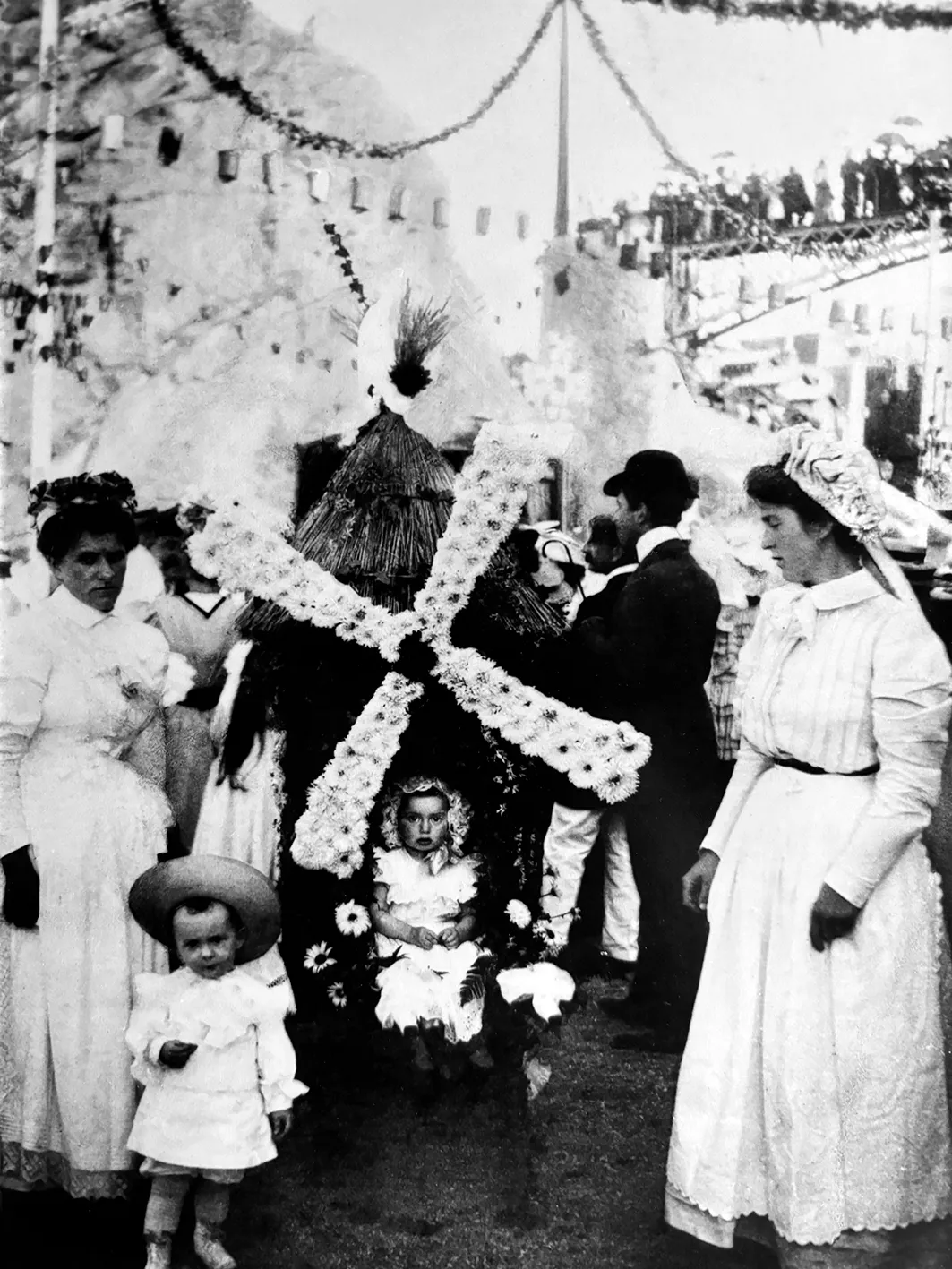 Christian Dior as a young boy with Serge Heftler-Louiche at the Granville flower carnival, 1908.
