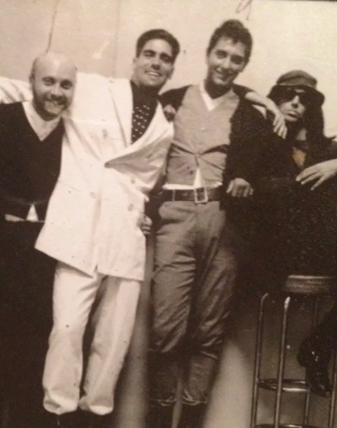 Polaroid showing Domenico Dolce, Aurelio Rodríguez, Stefano Gabbana, and Steven Meisel on a Dolce & Gabbana shoot, 1991.