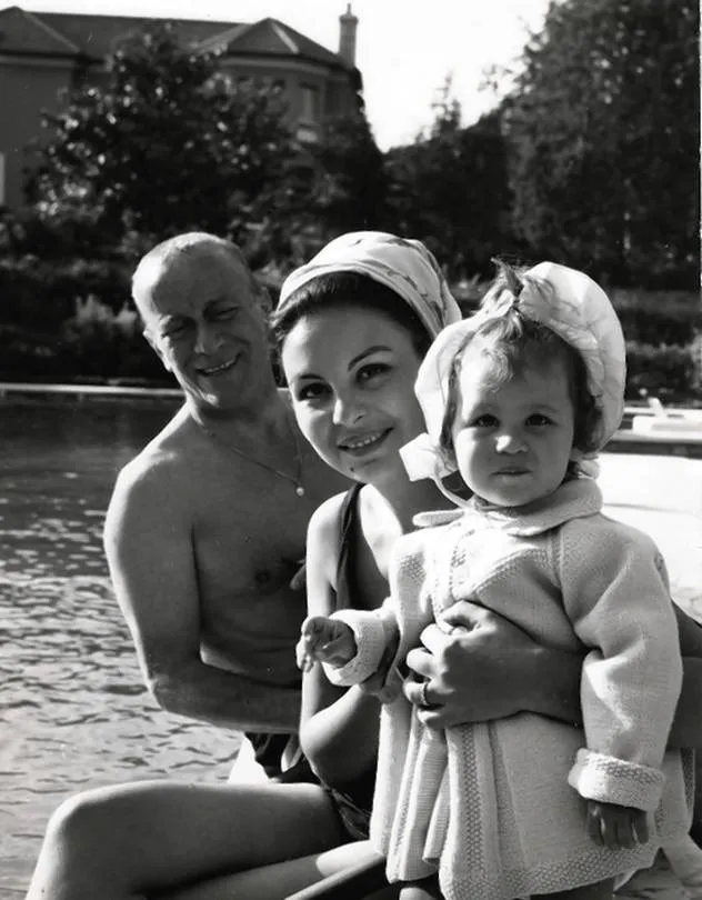 Aldo Gucci with Bruna Palombo and their daughter Patricia in Rome, 1965.
