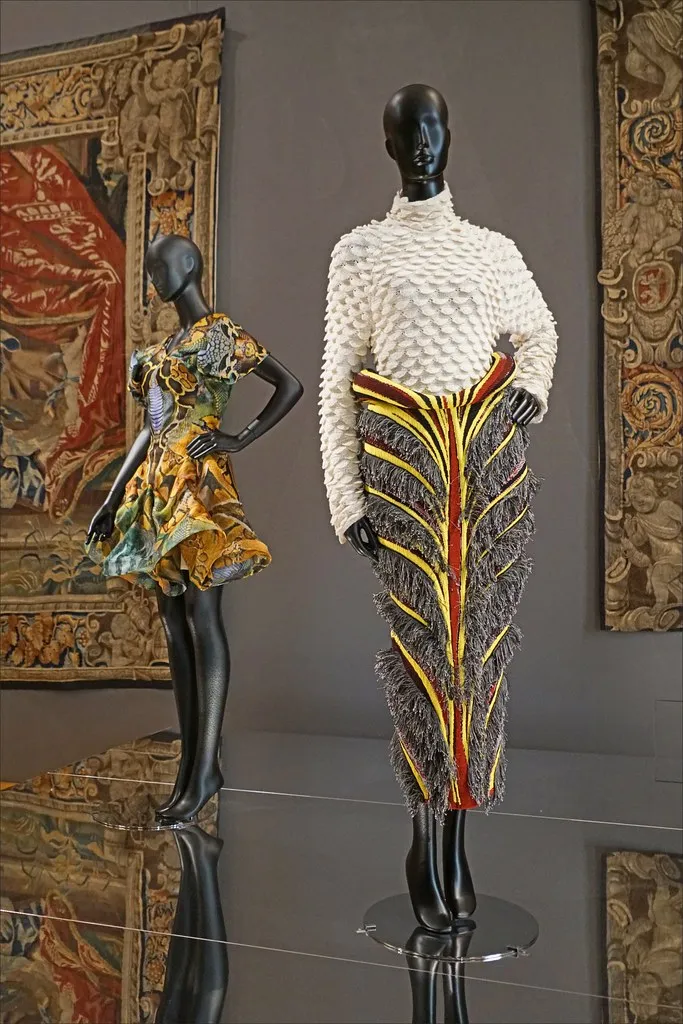 Matthieu Blazy Bottega Veneta FW 2023–24 ensemble (knit top and viscose-jacquard skirt) on display at the Louvre Couture exhibition, Paris, 2025.